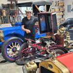 Alan Travis with his antique cars